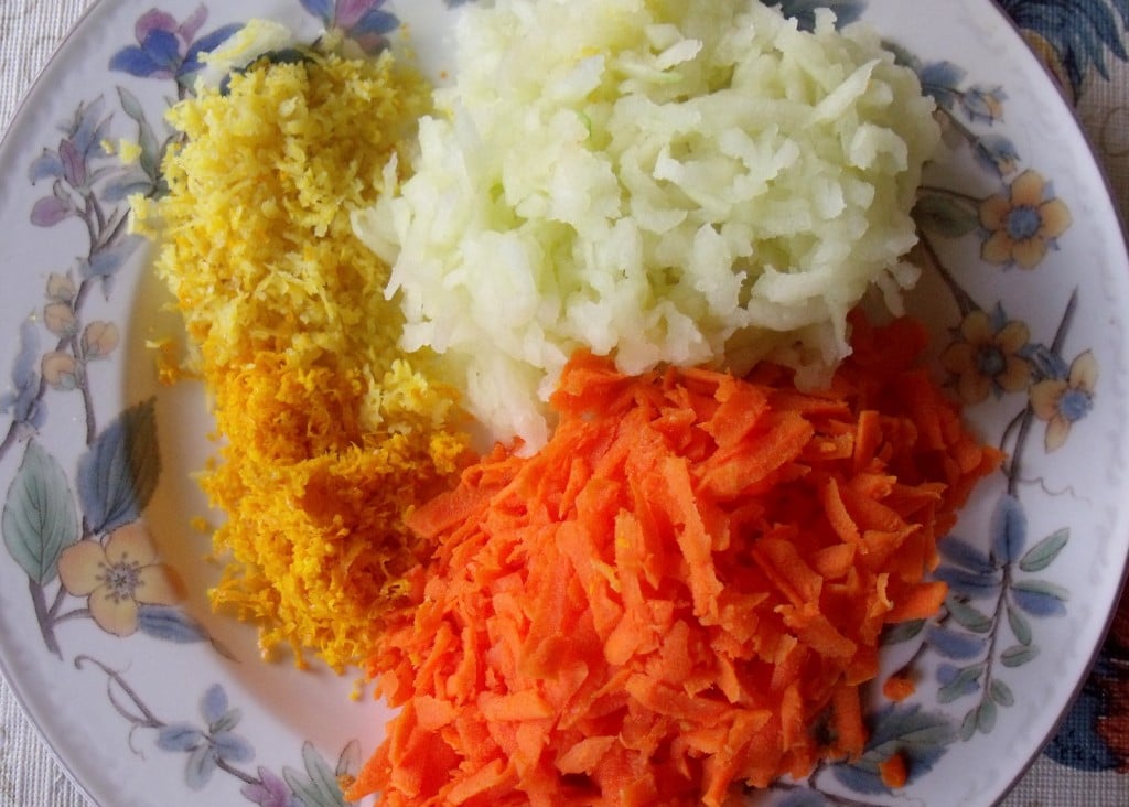 Lemon and orange peel, grated apple and carrot Carrot and apple for christmas pudding