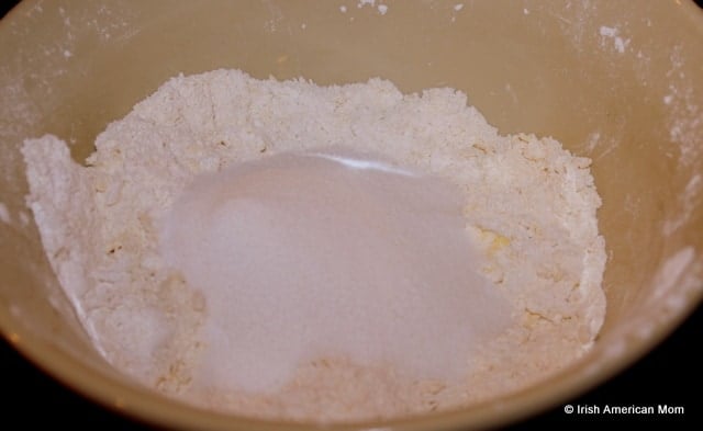 Adding sugar to Irish Apple Cake