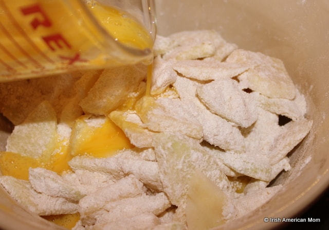 Adding eggs to Kerry apple cake