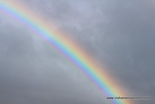 Irish Rainbow in cloudy sky