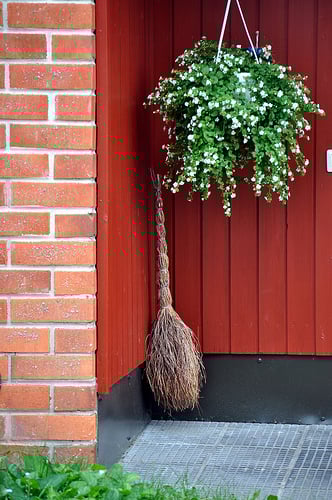 3687672643_fb5fe506cb A red cubby with a broom and hanging pant
