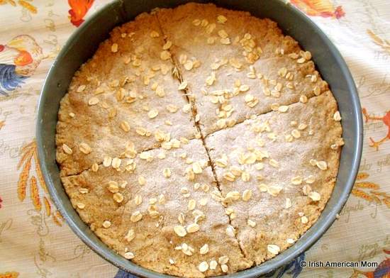 Brown bread dough marked with a cross in a baking tin prior to going in the oven | Irish American Mom Brown bread dough marked with a cross in a baking tin prior to going in the oven
