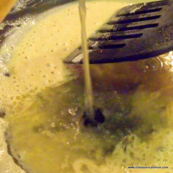 Adding stock to roux | Irish American Mom Adding stock to roux