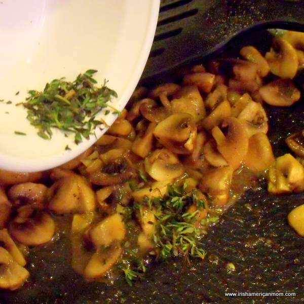 Adding thyme to sauteed mushrooms | Irish American Mom Adding thyme to sauteed mushrooms