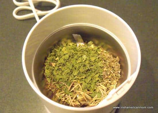 Herbs in coffee grinder for sausage rolls | Irish American Mom Herbs in coffee grinder