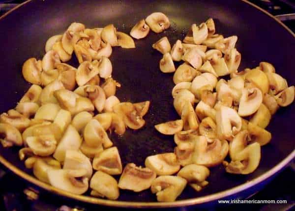 Mushrooms sauteeing in butter | Irish American Mom Mushrooms sauteeing in butter