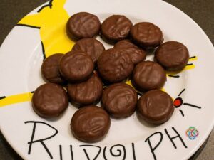 Chocolate mint cookies arranged on a plate, used as an ingredient for making easy no bake Baileys chocolate truffles.