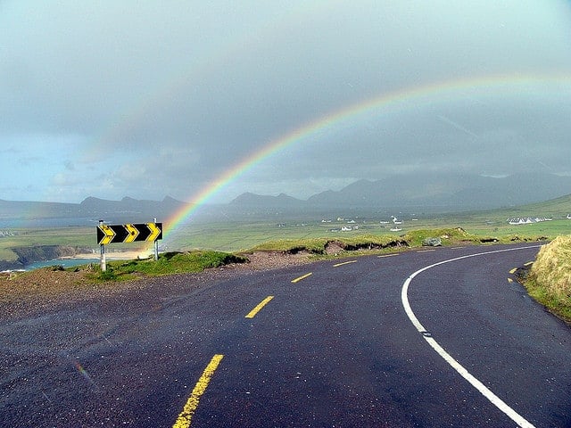 Dingle, Co. Kerry with a double Irish rainbow | Irish American Mom Rainbow over a field beside a road