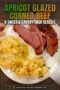 Slices of apricot glazed corned beef served on a white plate with boiled cabbage and potatoes, garnished with herbs on a rustic wooden background plus text overlay.