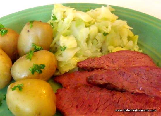 Corned beef, cabbage and potatoes | Irish American Mom A plate with boiled potatoes, corned beef and Irish style cabbage