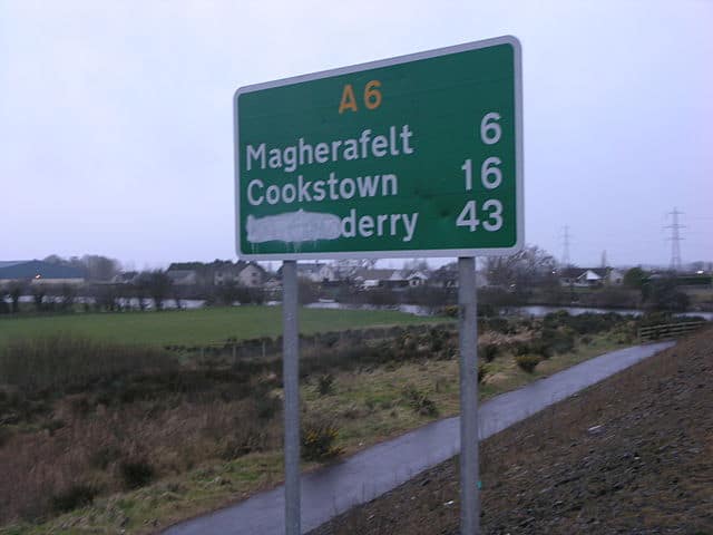 Northern Irish road sign for Magherafelt, Cookstown and Derry | Irish American Mom A sign on the side of a road