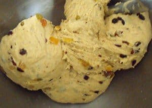Kneading dough in an electric mixer for hot cross buns