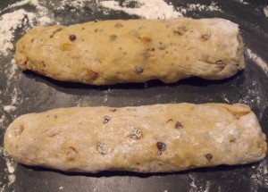 Two dough logs on a flour dusted surface