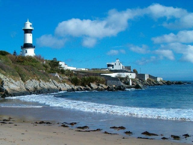 Lighthouse beside a beach