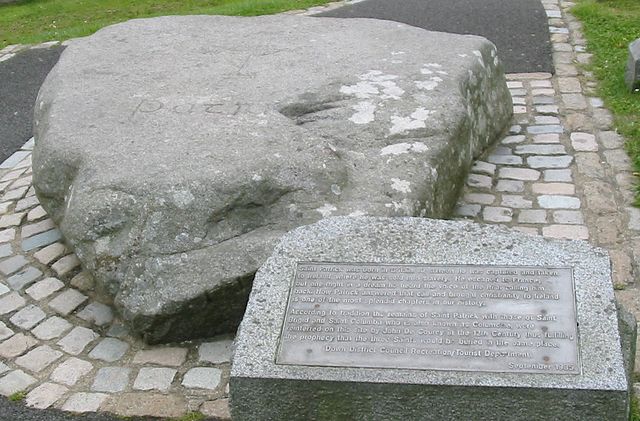 St Patrick's grave in County Down | Irish American Mom Large stone over Saint Patrick's grave site in Downpatrick County Down Northern Ireland