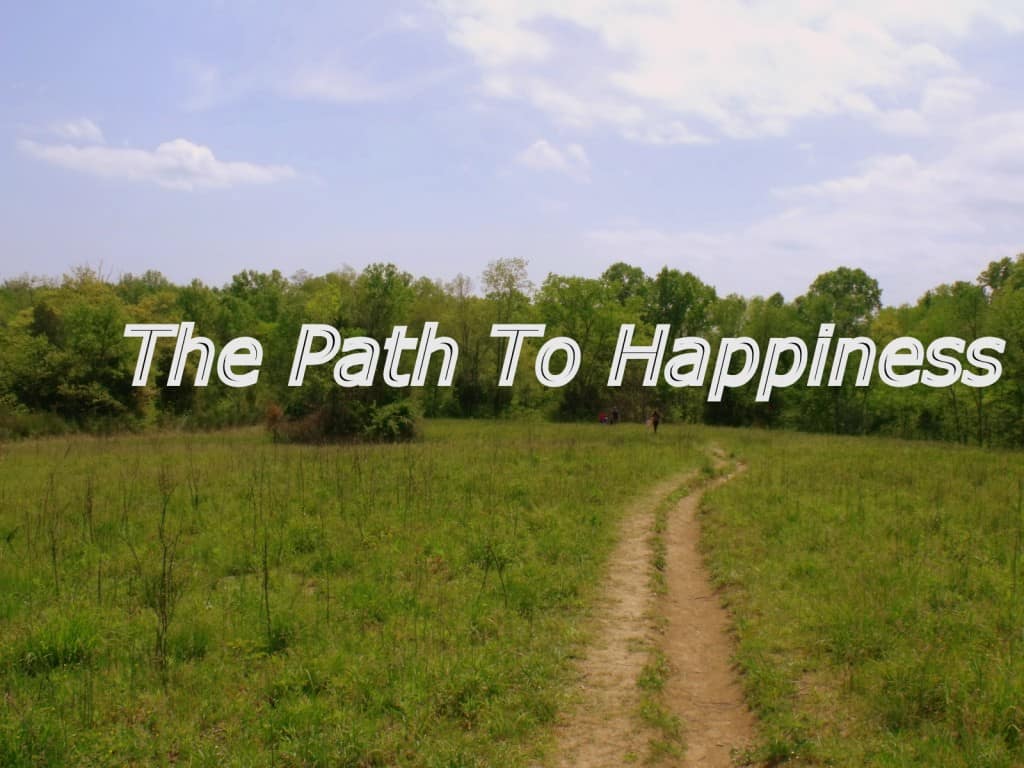 A dirt path with text