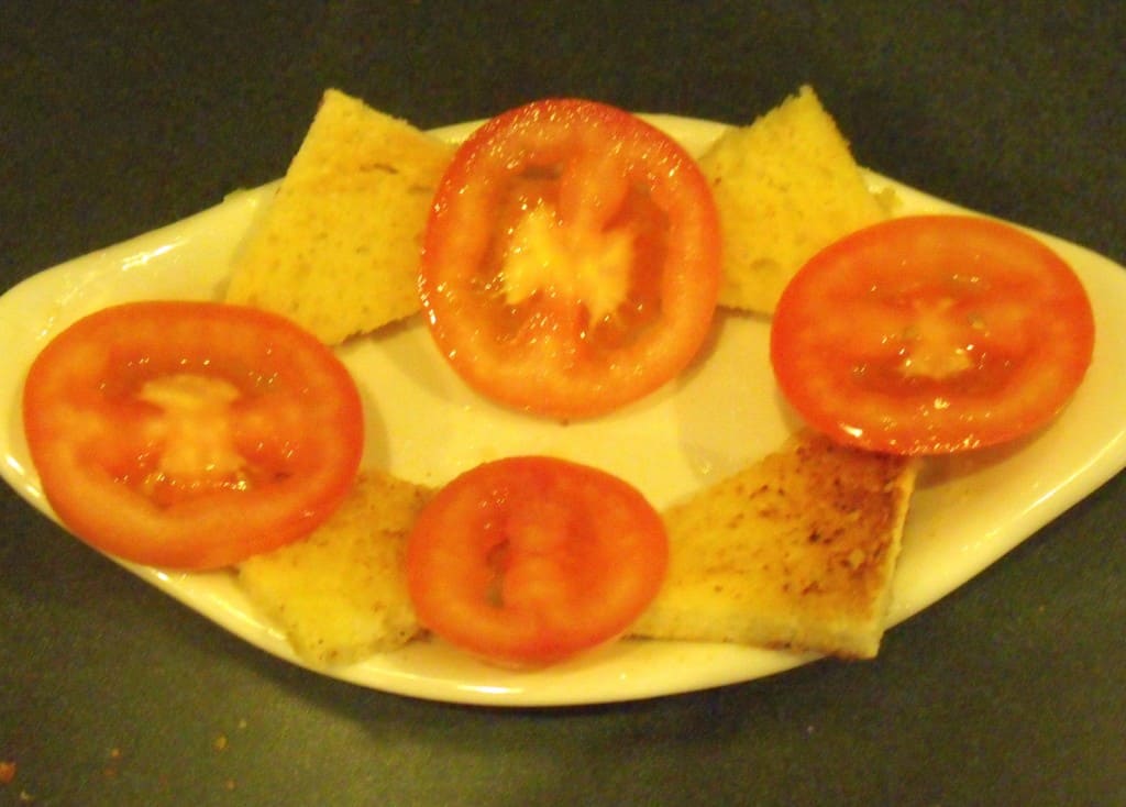 Texas toast on the bottom of a Kentucky Hot Brown Sandwich