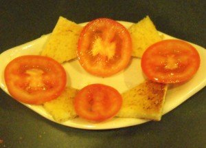 Texas toast on the bottom of a Kentucky Hot Brown Sandwich
