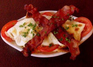 Tomato and bacon on a Kentucky Hot Brown Sandwich