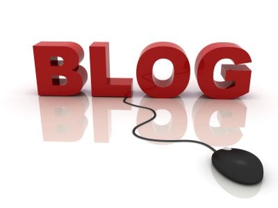 Blog written in red | Irish American Mom Graphic with block text and a computer mouse