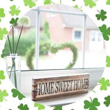 Block letter sign with shamrock border