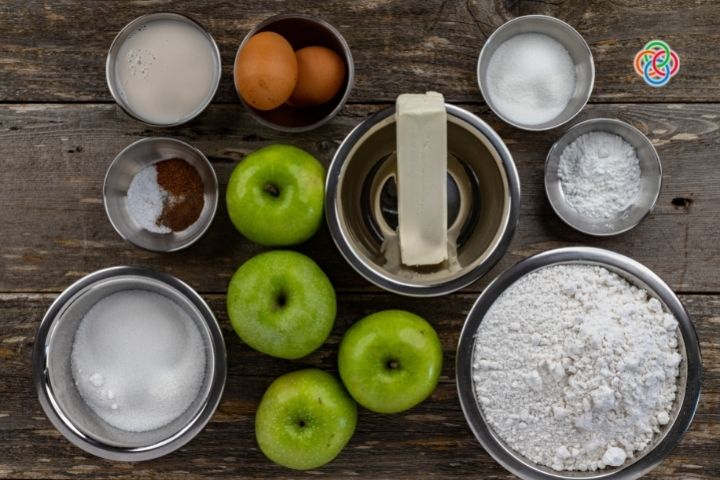 Ingredients for Kerry Apple Cake Baking ingredients in bowls with apples