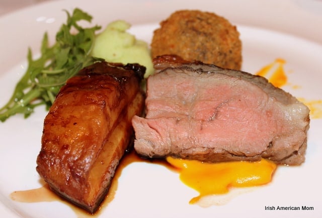 Duo of Local Pork Belly and Sous-Vide Rump of Sliced Lamb, Black Pudding Croquette, Carrot Puree and Red Wine Jus Duo of Local Pork Belly and Sous-Vide Rump of Sliced Lamb, Black Pudding Croquette, Carrot Puree and Red Wine Jus