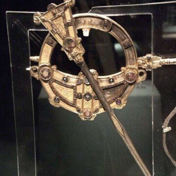 A golden brooch with intricate designs