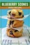 Single-image Celtic-styled poster of golden Irish blueberry scones on a rustic surface with text banner at the top in shades of green, orange and cream.