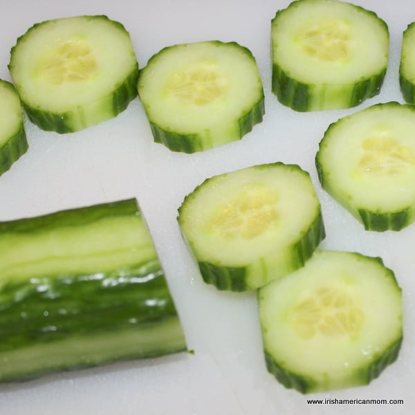 Sliced cucumber | Irish American Mom Sliced cucumber on a chopping board