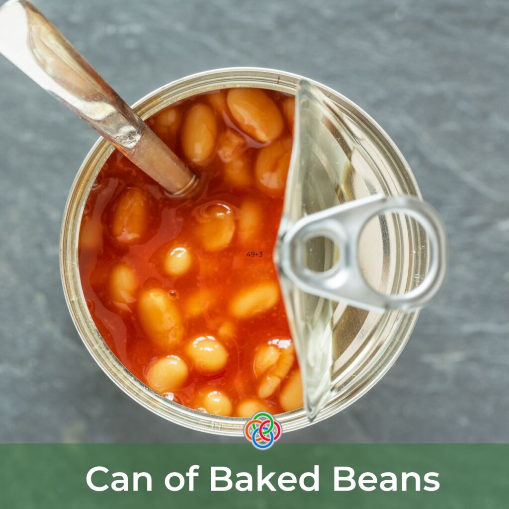 Open can of baked beans with spoon and text banner
