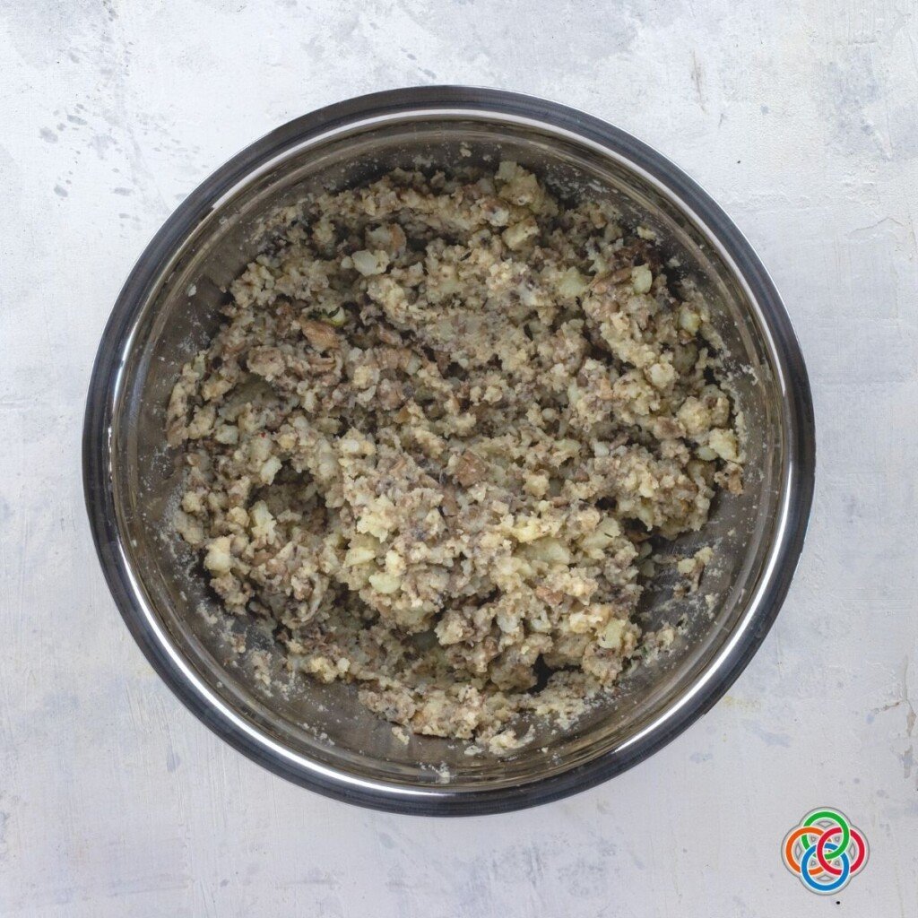 Mushroom and potato filling for a potato bite appetizer for Saint Patrick's Day | Irish American Mom Mashed potato and mushroom filling in a bowl