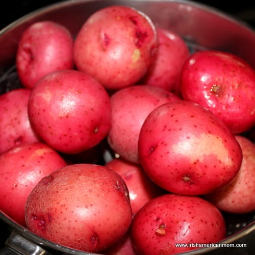 Steaming red potatoes for cheese potato bite Irish starter | Irish American Mom Steaming red potatoes