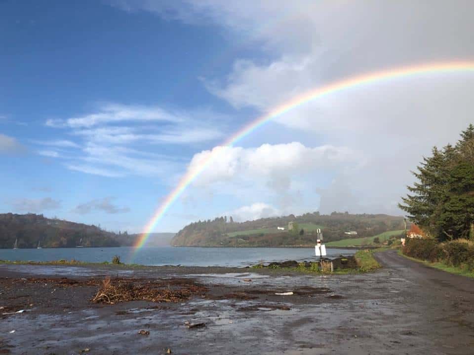 Rainbow over Reen Pier near Union Hall County Cork Ireland | Irish American Mom A rainbow over water