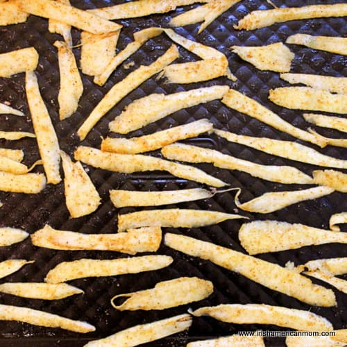 Parsnip chips on baking tray | Irish American Mom Parsnip chips on baking tray
