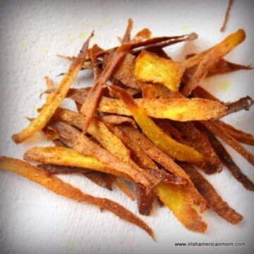 Parsnip crisps or slivers on paper towel