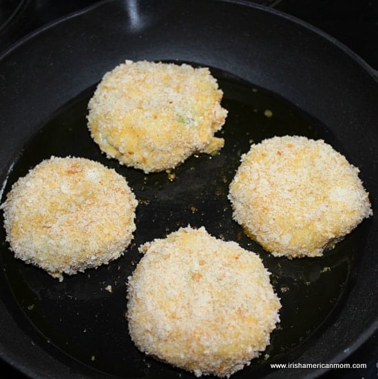 Frying fish cakes in a cast iron skillet | Irish American Mom Frying fish cakes in a cast iron skillet