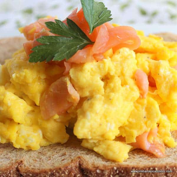 An Irish breakfast - smoked salmon scrambled eggs | Irish American Mom Close up view of scrambled eggs with smoked salmon