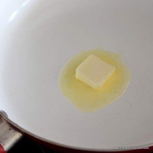 Butter melting in a hot skillet for scrambled eggs