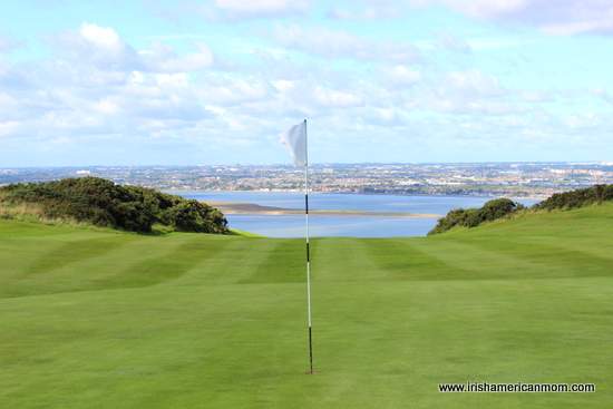 A flag in a golf hole on Howth golf course