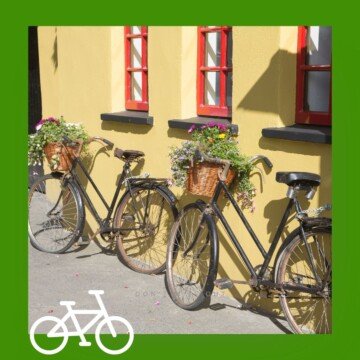 Bicycles beside a wall