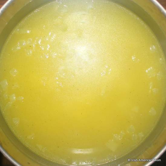 Adding stock to Irish potato soup | Irish American Mom Adding stock to Irish potato soup