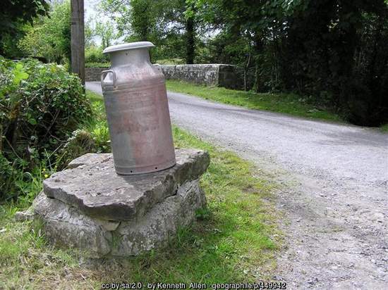 Churn on a milk stand