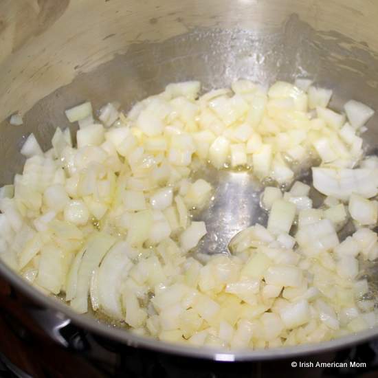 Coating onion in melted butter | Irish American Mom Coating onion in melted butter
