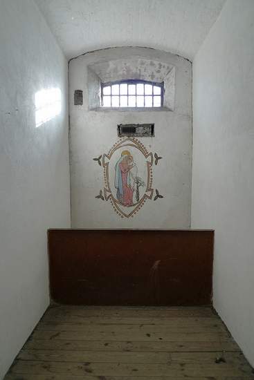 Grace Gifford's Prison Cell in Kilmainham Gaol with the mural she painted | Irish American Mom Grace Gifford's Prison Cell in Kilmainham Gaol with the mural she painted