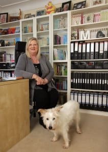 Marita Conlon McKenna Favourites PIx Ronan Lang/Feature File | Irish American Mom A dog standing beside a woman in a store