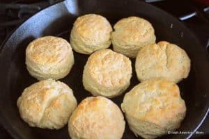 A cast iron pan with freshly baked scones or biscuits