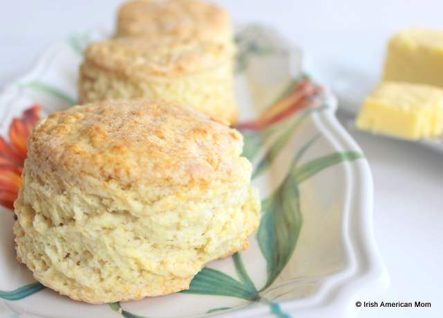 Three Irish buttermilk scones on a floral decorative plate