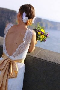 A bride looking at the Cliffs of Moher