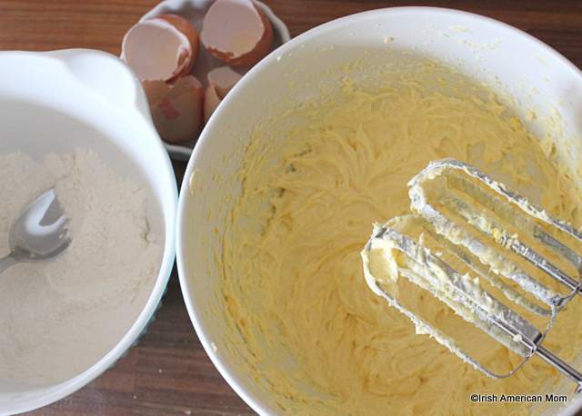 adding-eggs-one-at-a-time-with-a-little-flour-for-a-victoria-sponge-cake-batter | Irish American Mom Add eggs one at a time to butter sponge batter with a little flour